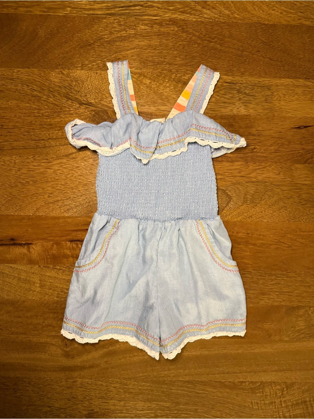 Matilda Jane Pale Blue Smocked Romper with Rainbow Stripe Straps